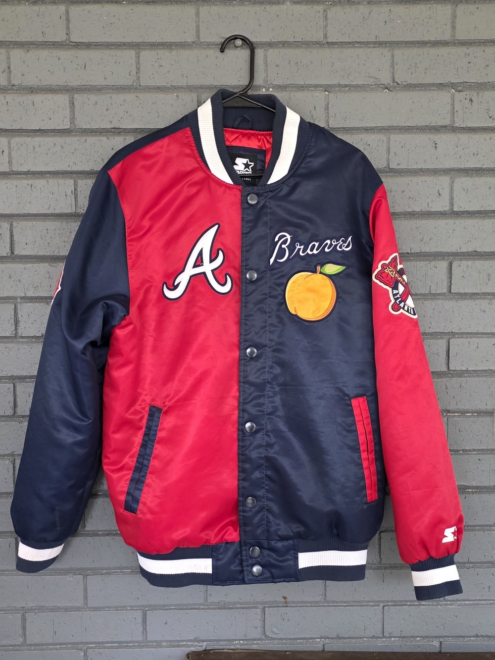 Starter mens Braves Half-Red Half-Navy Satin Jacket with Peach Patch